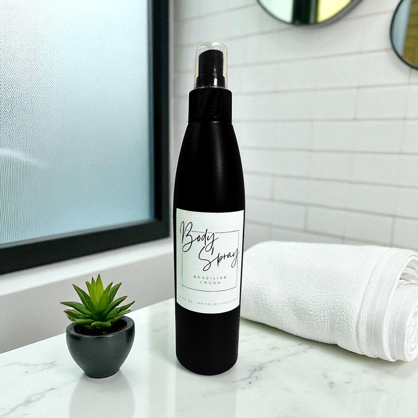 Doodlations Coffee Bar & Boutique black bottle of Brazilian Crush moisturizing body spray with aloe and hydrating butters.