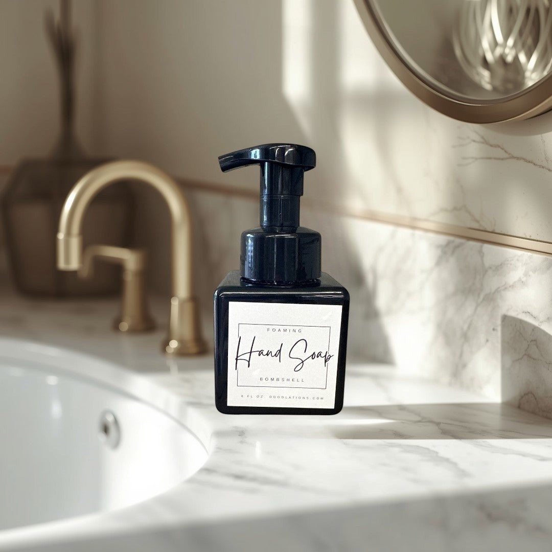 Doodlations Bombshell foaming hand soap in a black square bottle with a white label.