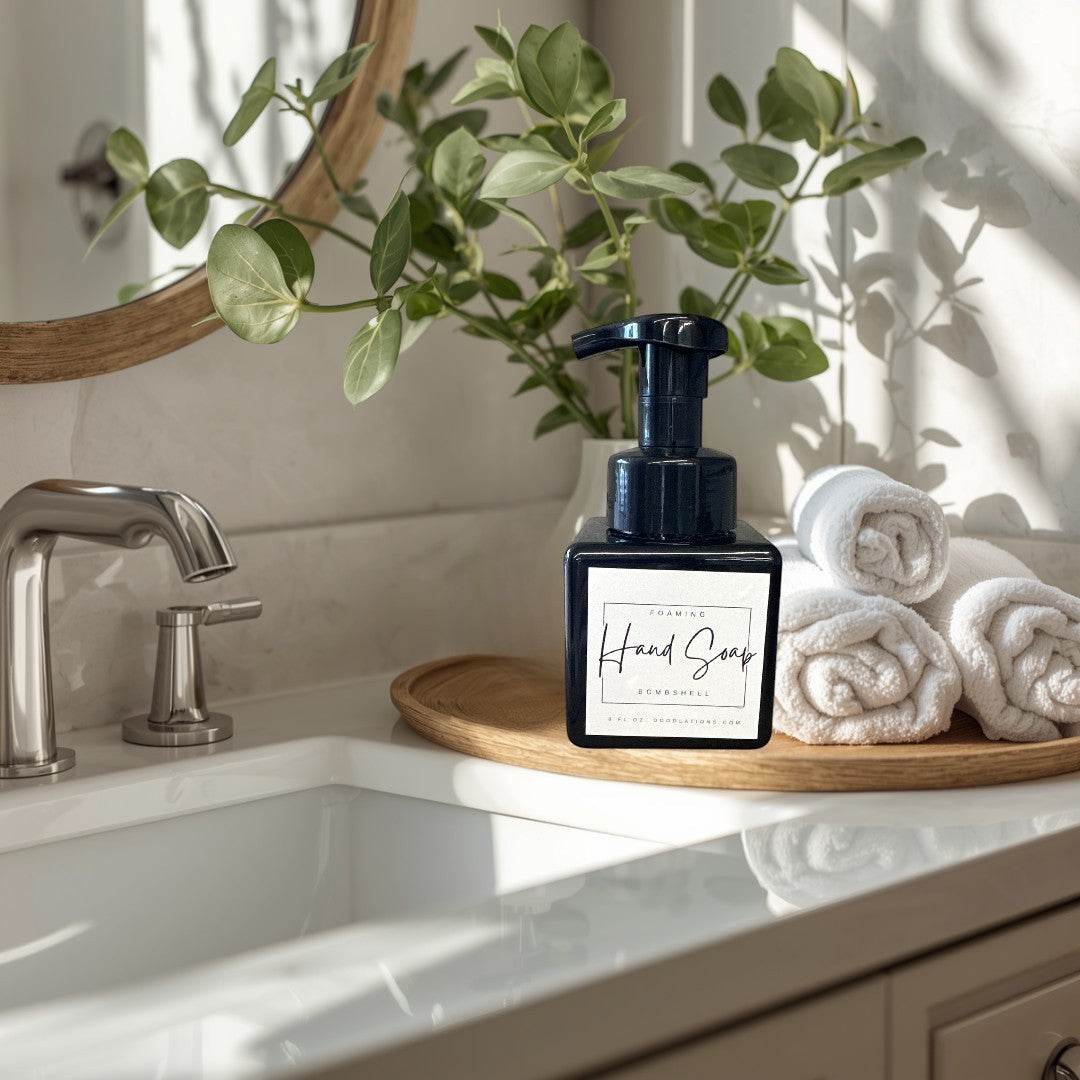 Doodlations Bombshell foaming hand soap in a black square bottle with a white label.