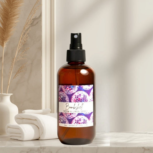 Doodlations Bombshell room and linen spray in amber bottle with disco ball label. Inspired by Victoria's Secret Bombshell.