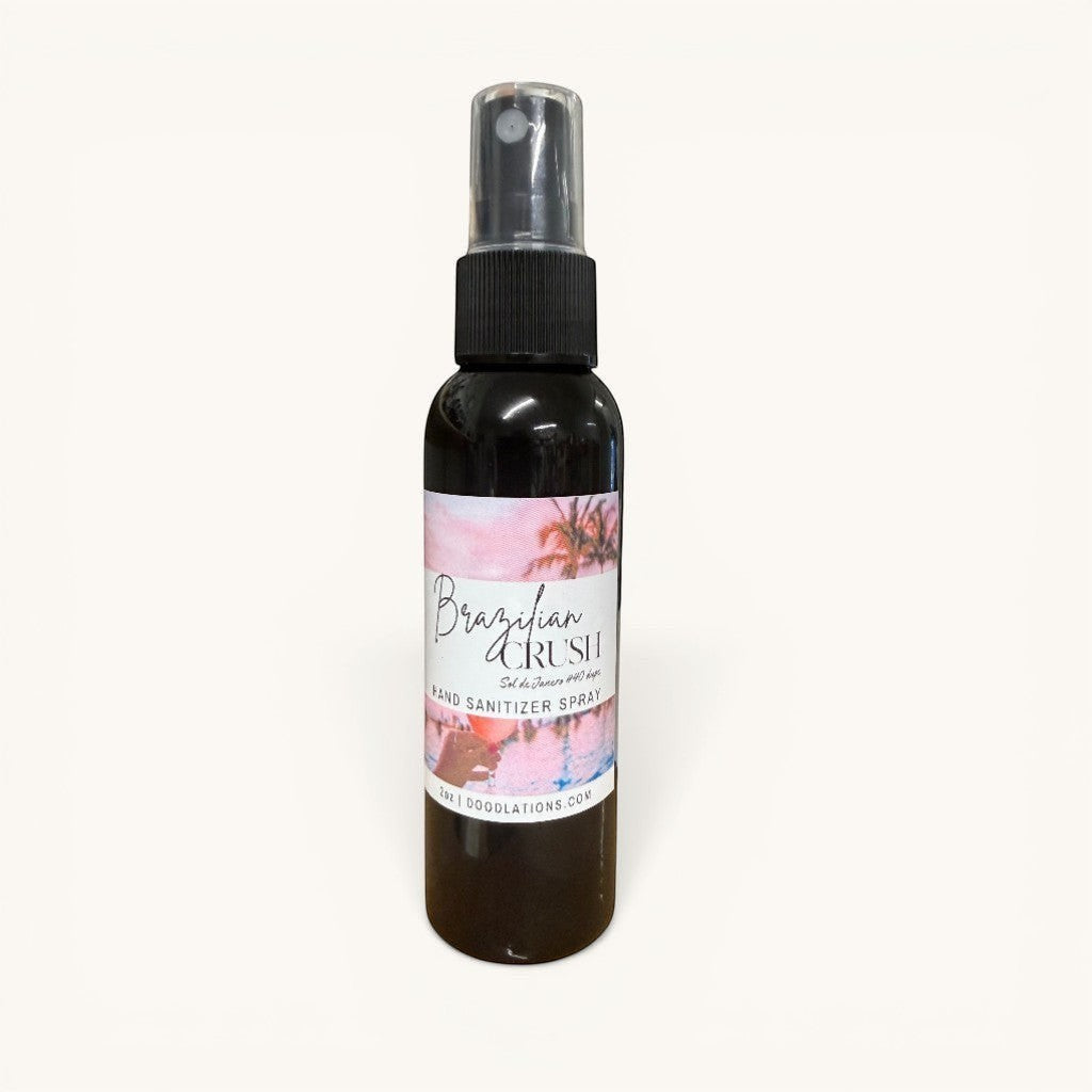 Doodlations Brazilian Crush hand sanitizer spray with tropical sunset label. 2oz bottle.