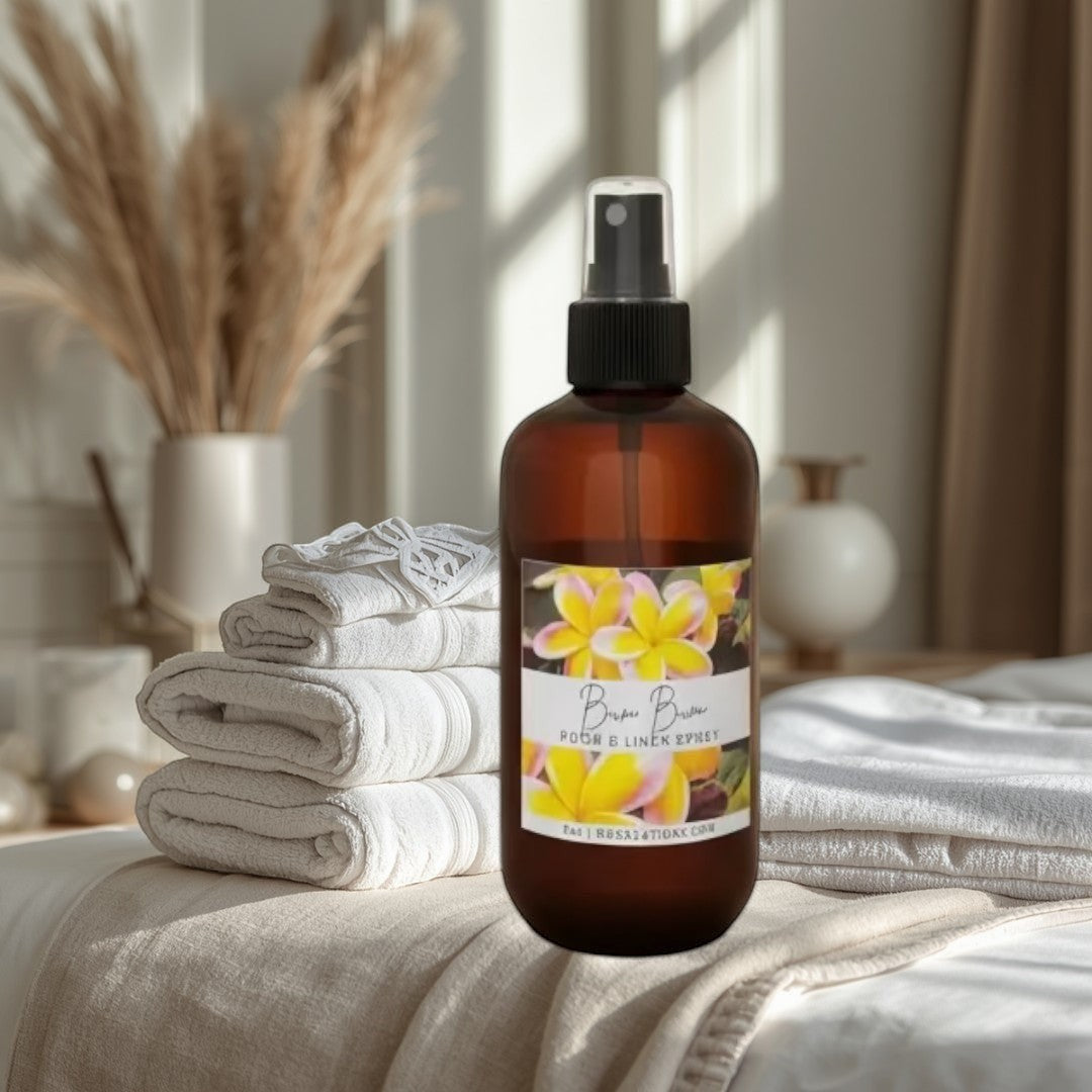 Doodlations Bum Bum room and linen spray in amber bottle with floral label. Tropical scent.