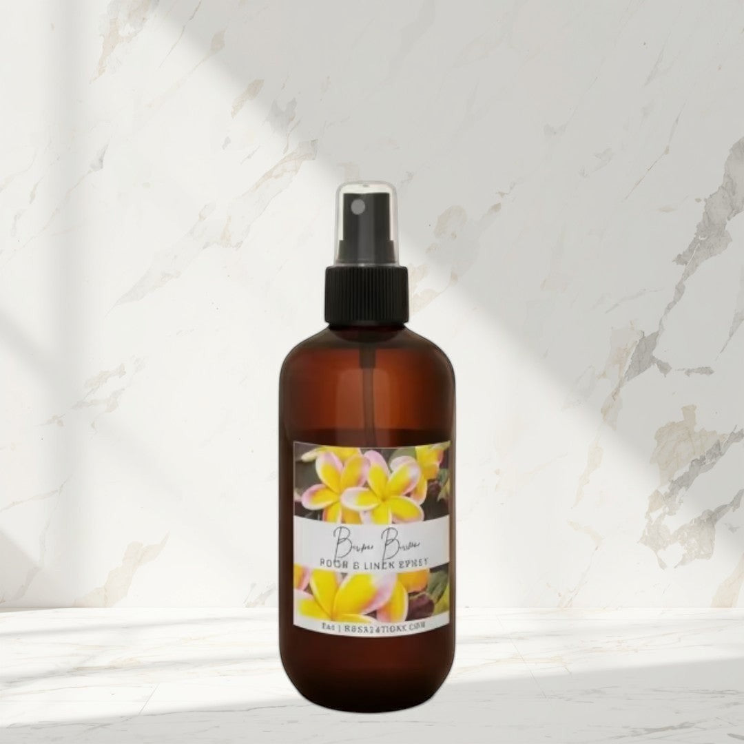 Bum Bum room and linen spray in amber bottle with floral label. Tropical scent.