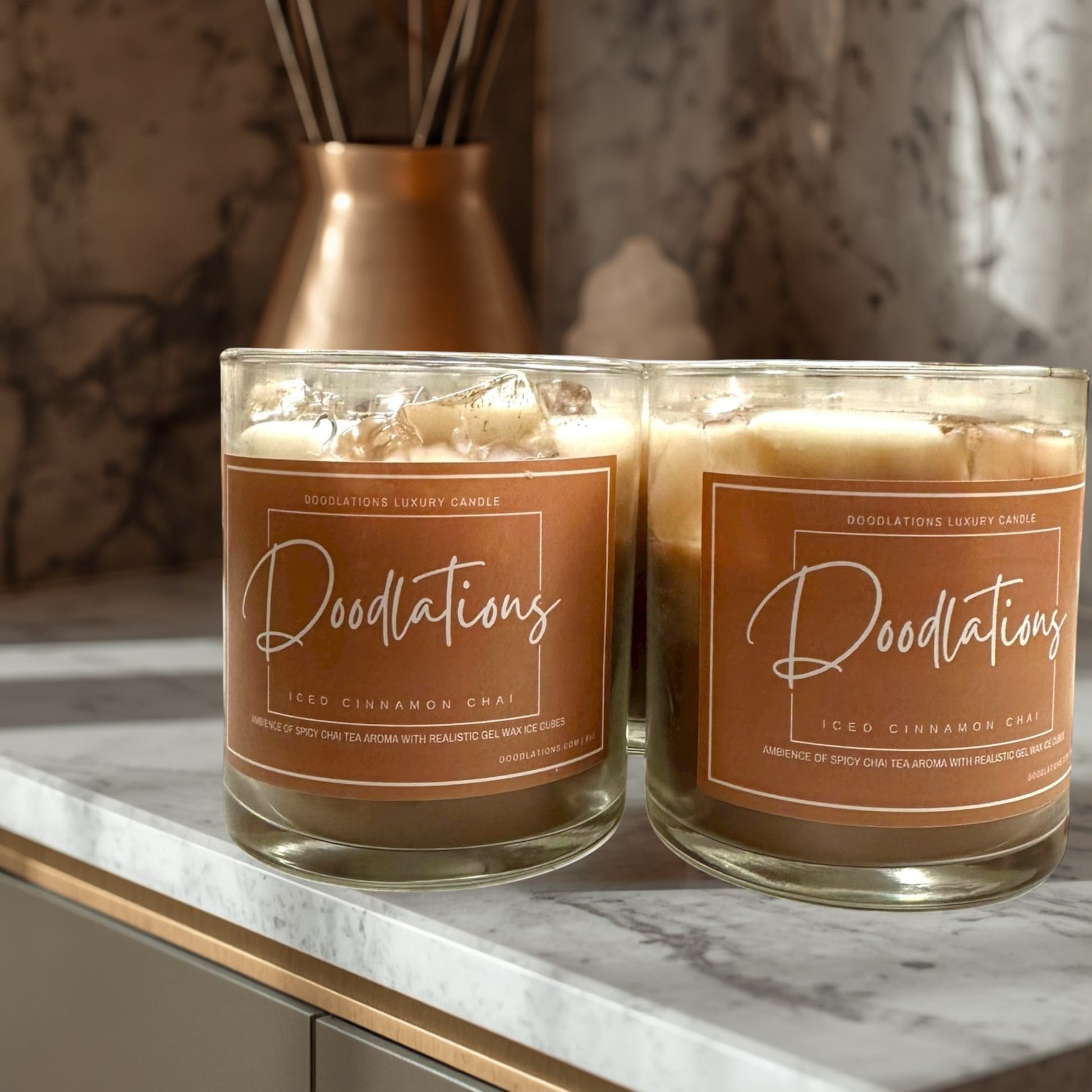 Doodlations Coffee Bar & Boutique Cinnamon Chai Latte candle with realistic wax ice cubes and single wick.