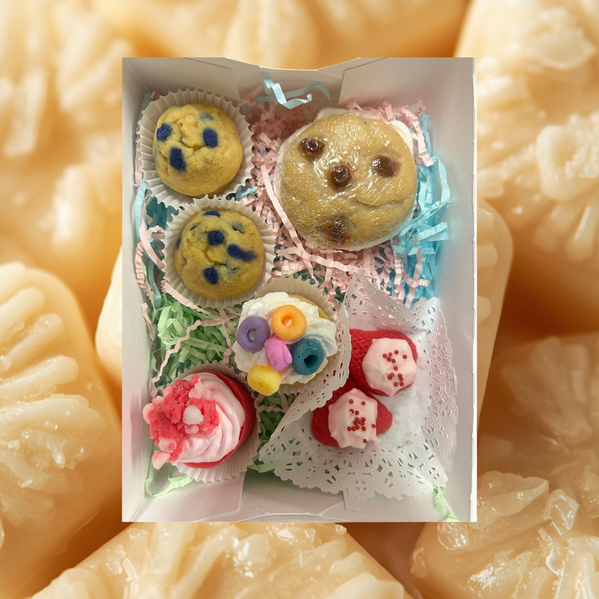 Doodlations Coffee Bar & Boutique Bakery Sampler Wax Melts: blueberry cookies, frosted cupcake, and strawberry tarts.