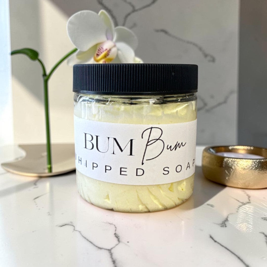 Doodlations Coffee Bar & Boutique Bum Bum Whipped Soap in a 4oz jar with a black lid and tropical coconut scent.