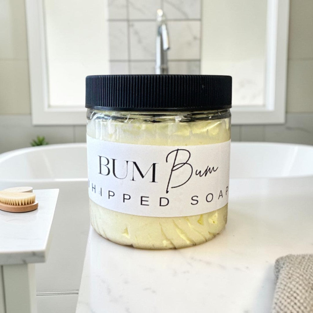 Doodlations Coffee Bar & Boutique Bum Bum Whipped Soap in a 4oz jar with a black lid and tropical coconut scent.
