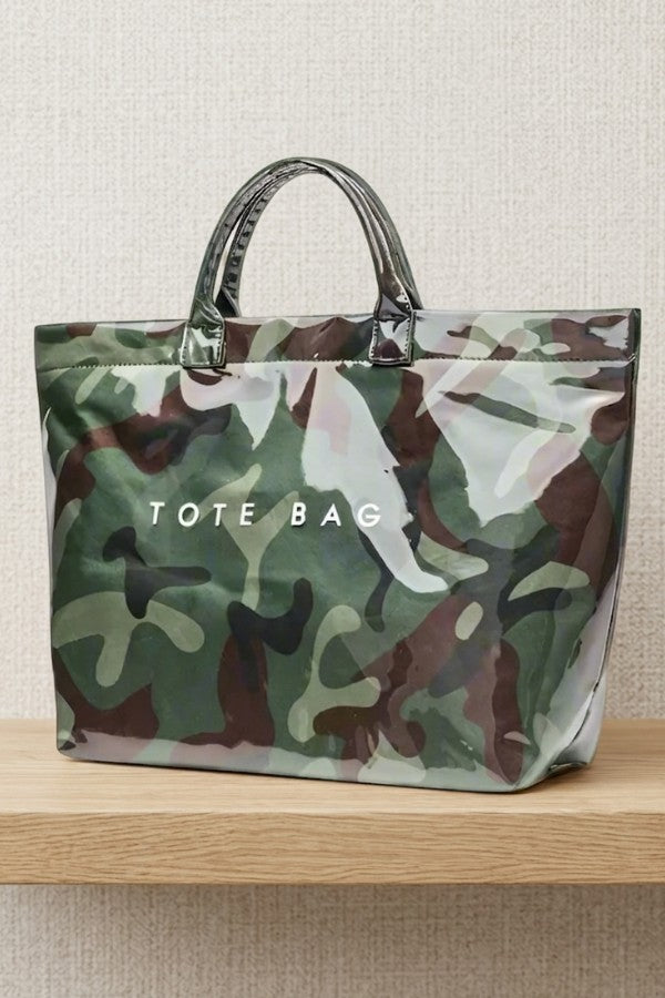 Doodlations Coffee Bar & Boutique green camouflage tote bag with a glossy PVC finish and sturdy top handles.