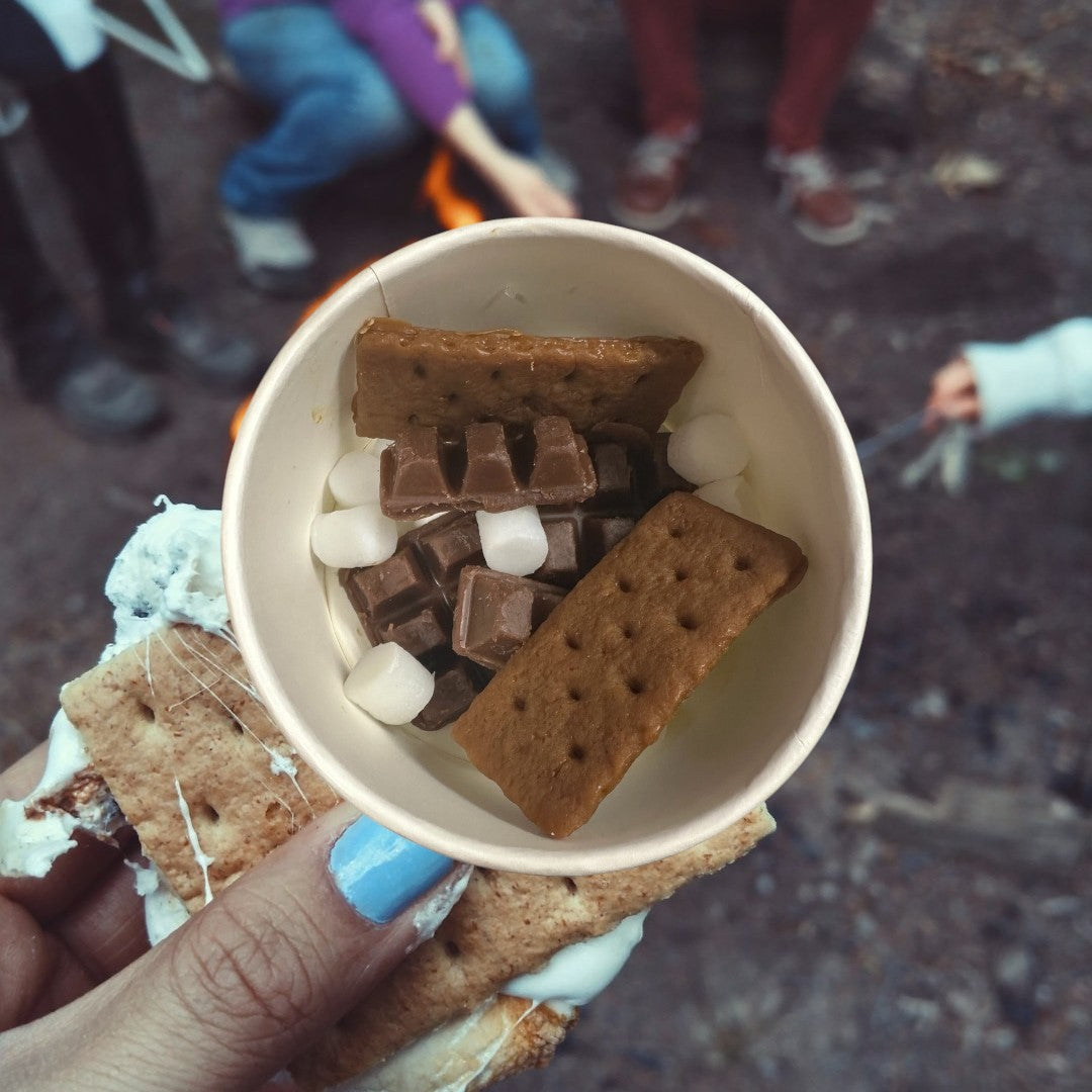 Doodlations Coffee Bar & Boutique Smores wax melts shaped like graham crackers, chocolate bars, and marshmallows.