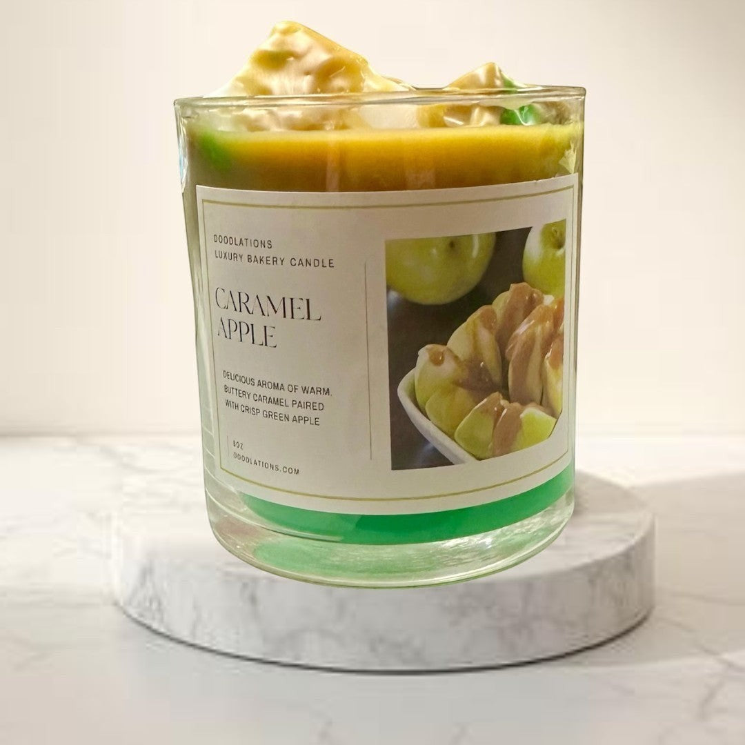 Doodlations Coffee Bar & Boutique Apple Caramel Candle with wax apples on top. 8oz.