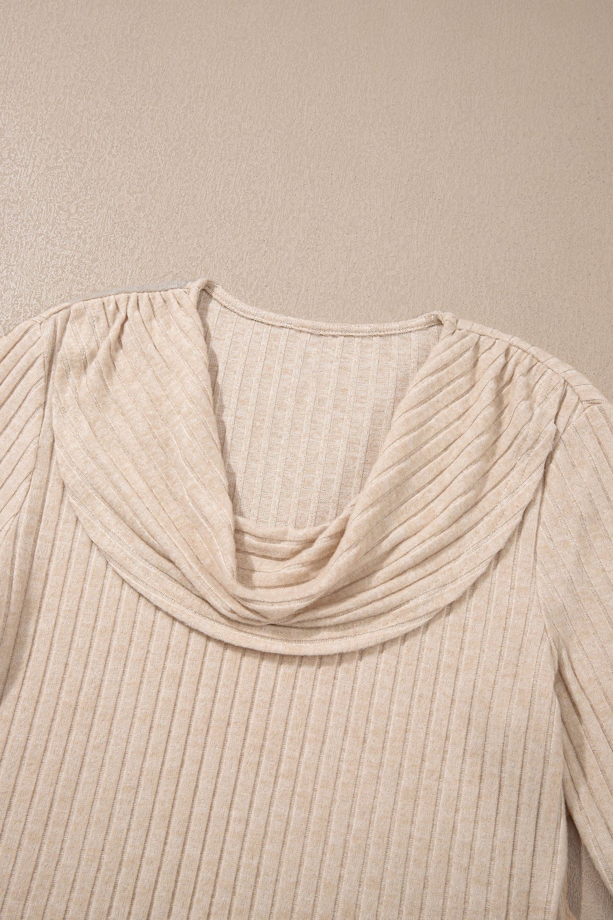 Doodlations Coffee Bar & Boutique apricot ribbed knit long sleeve top with a relaxed cowl neckline.