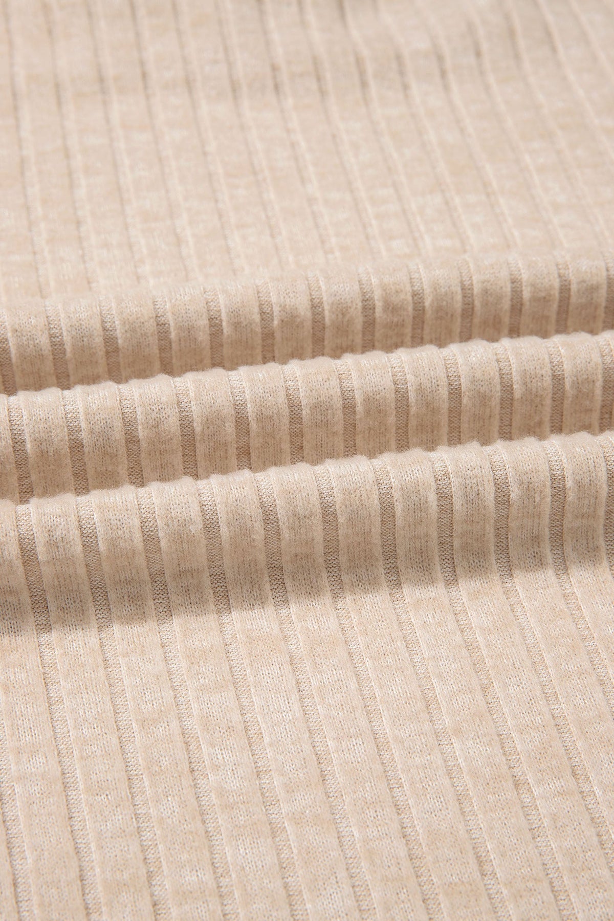 Doodlations Coffee Bar & Boutique apricot ribbed knit fabric texture with soft vertical ridges