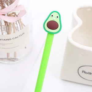 Doodlations Coffee Bar & Boutique avocado cartoon gel pen with a 3D soft rubber topper and vibrant green barrel.
