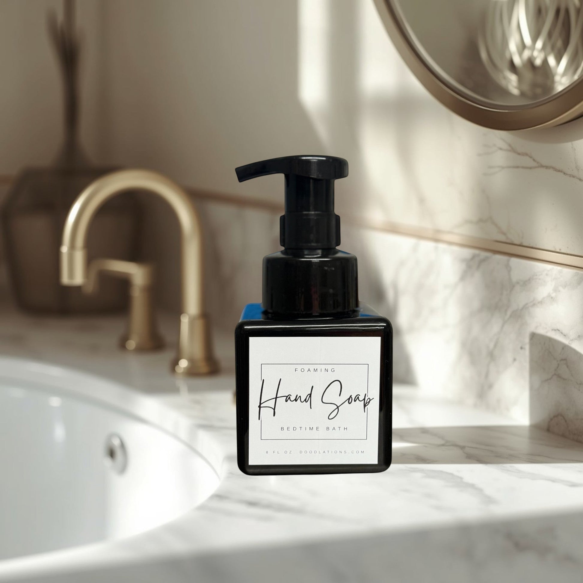 Doodlations Coffee Bar & Boutique Bedtime Bath foaming hand soap in a black square bottle with a white label.