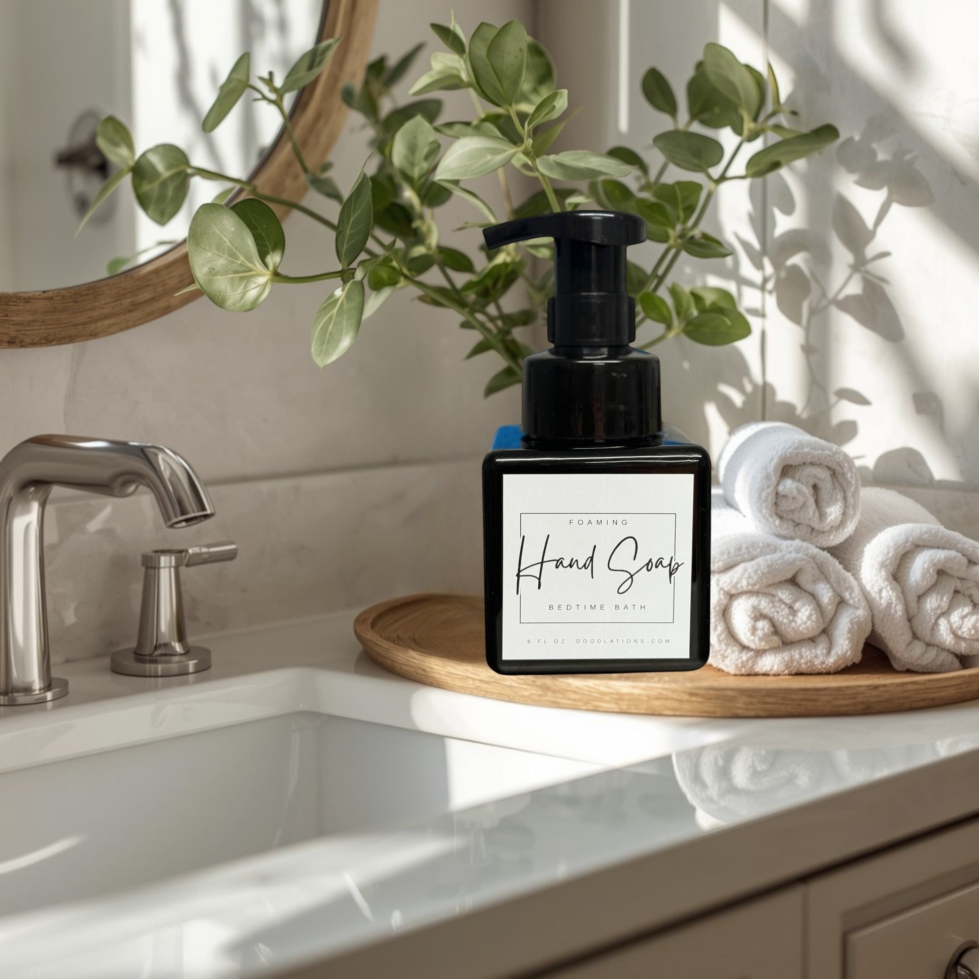 Doodlations Coffee Bar & Boutique Bedtime Bath foaming hand soap in a black square bottle with a white label.
