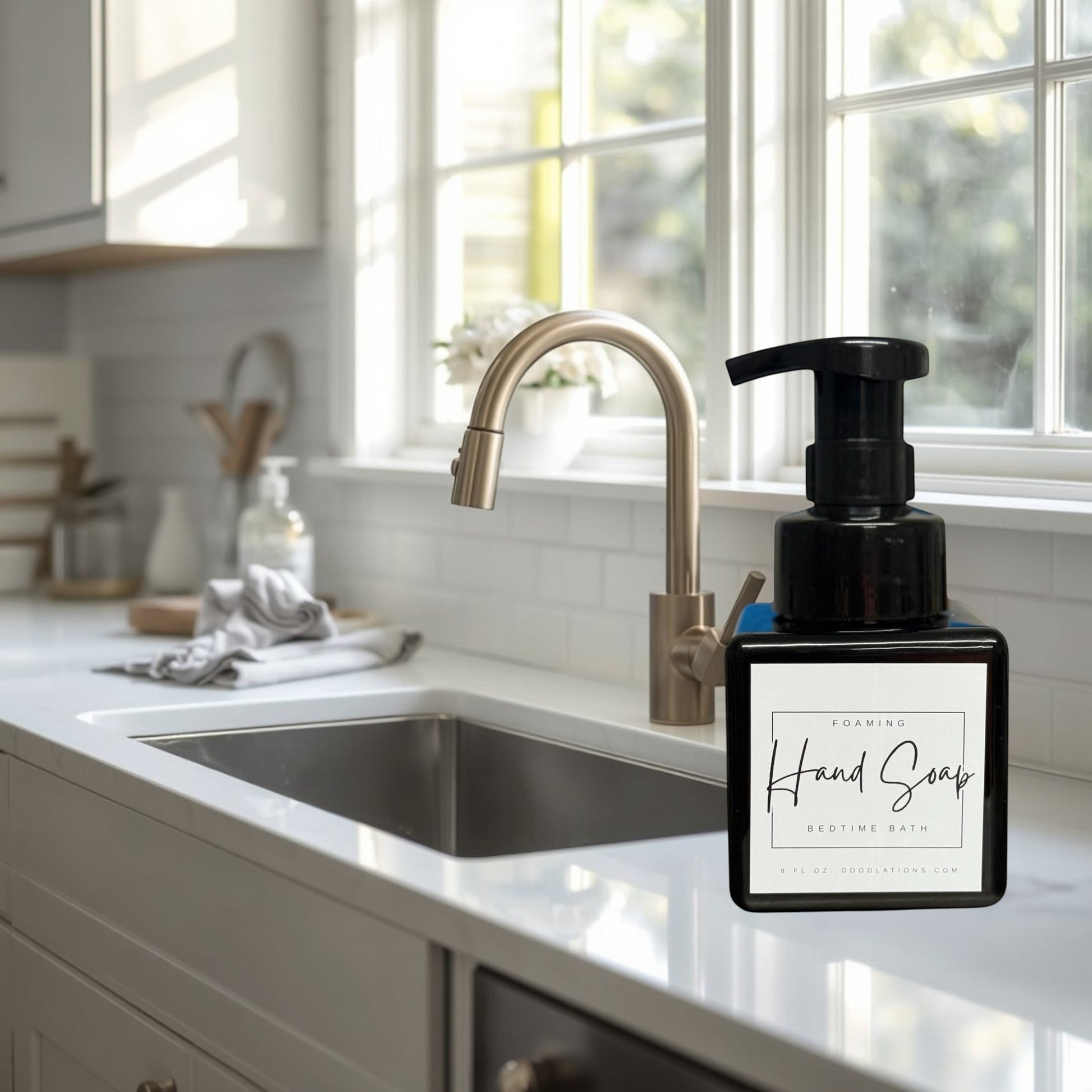 Doodlations Coffee Bar & Boutique Bedtime Bath foaming hand soap in a black square bottle with a white label.