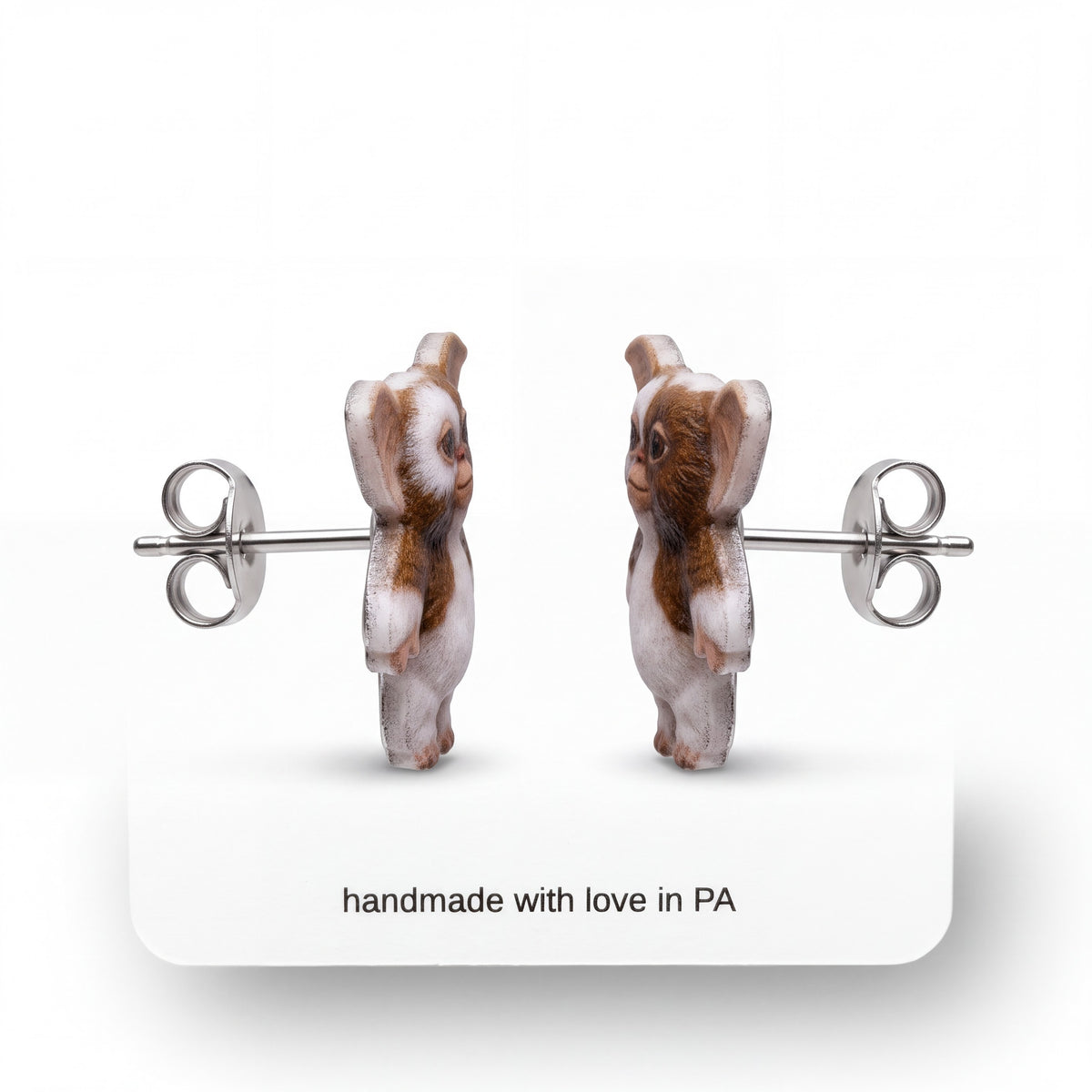 Doodlations Coffee Bar & Boutique Before Midnight handmade earrings featuring brown and white creature designs