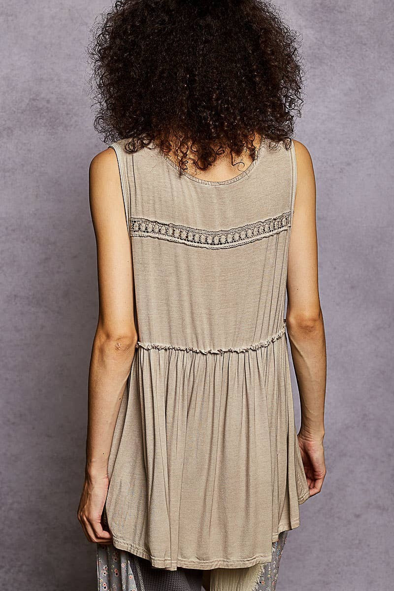 Doodlations Coffee Bar & Boutique beige sleeveless babydoll knit top with lace trim and ruffle back yoke detail