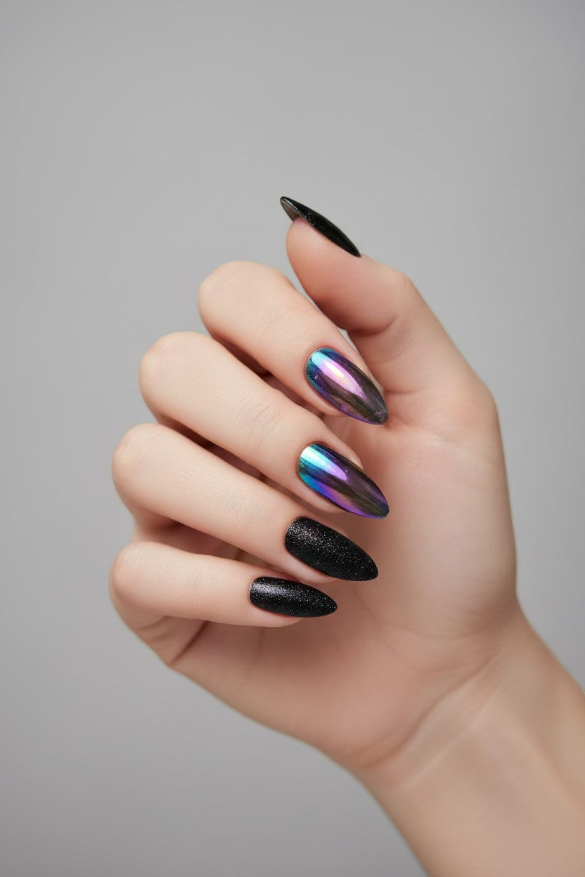 Doodlations Coffee Bar & Boutique black glitter and iridescent chrome stiletto press-on nails.