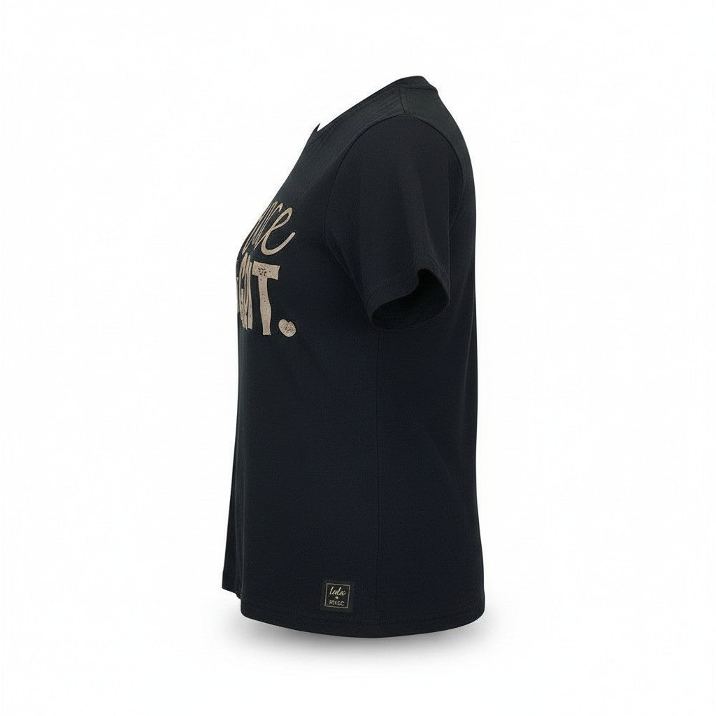 Side view of a black Doodlations Coffee Bar & Boutique Lulu Mac Grace and Grit t-shirt with gold graphic text.