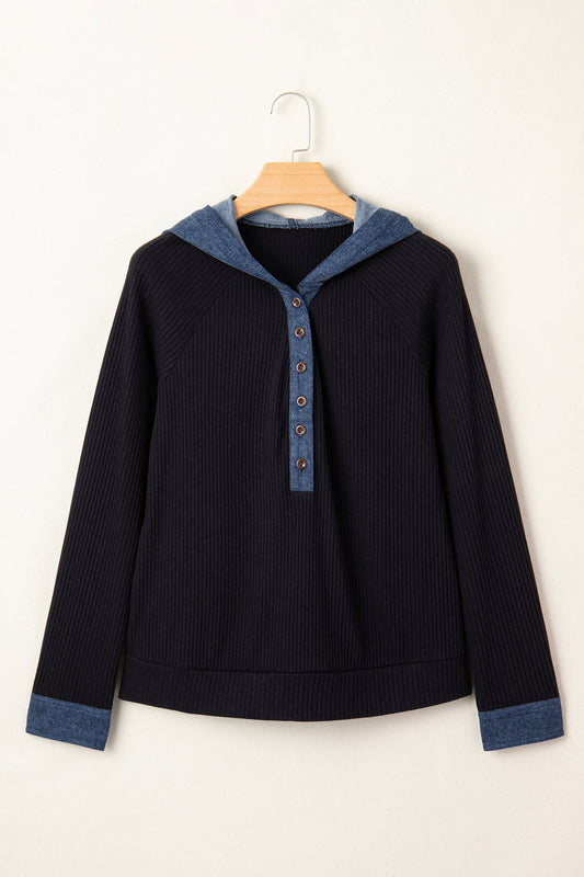 Doodlations Coffee Bar & Boutique black ribbed knit hooded pullover with contrasting denim hood, cuffs, and buttons.