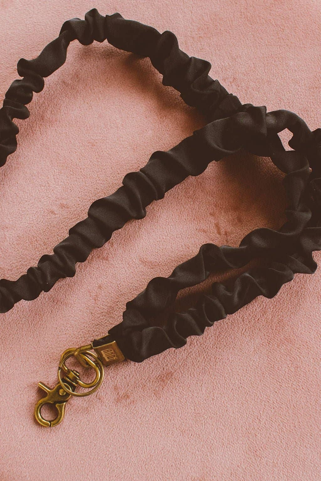 Doodlations Coffee Bar & Boutique black silky sateen scrunchie lanyard with a gold-tone metal clasp