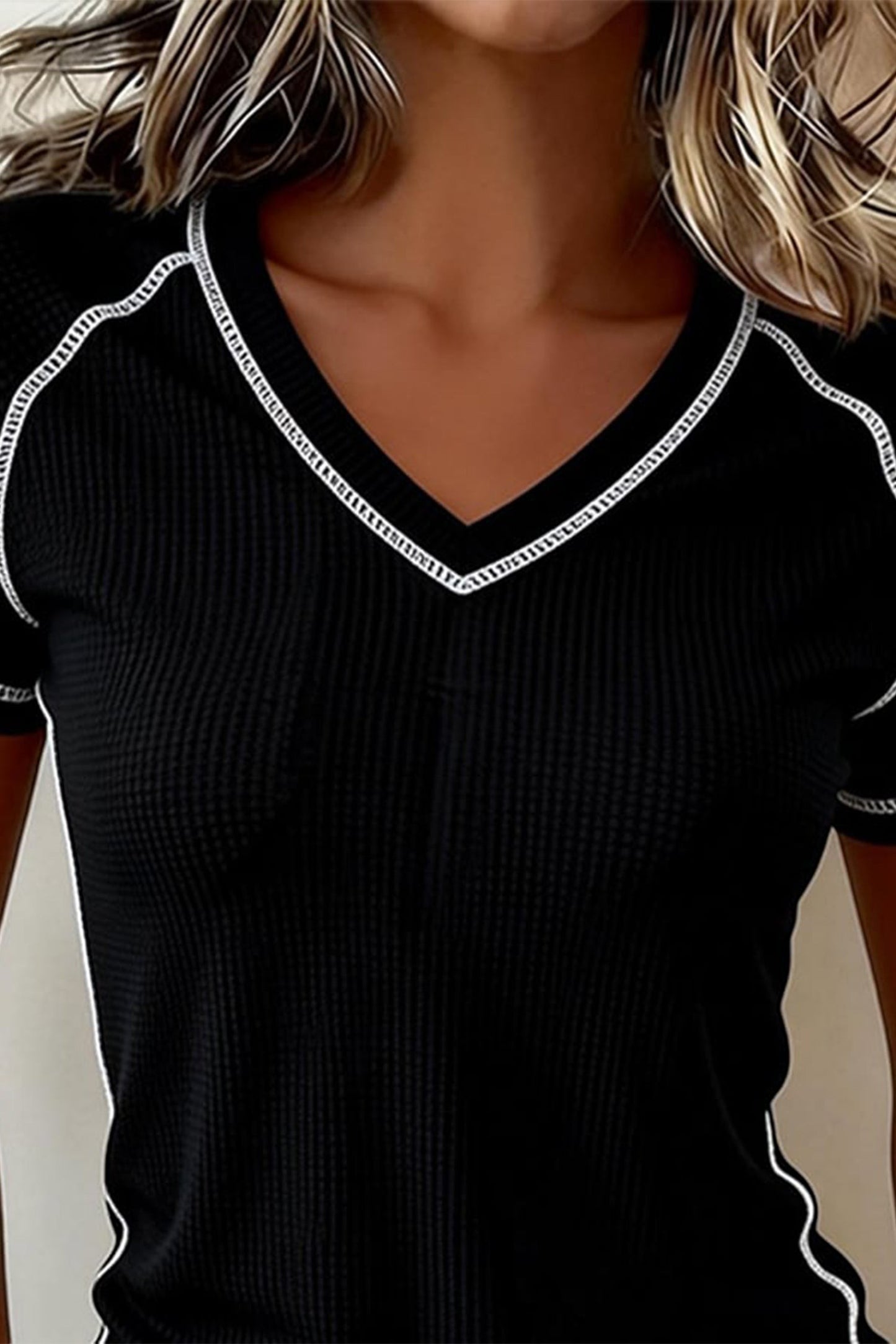 Doodlations Coffee Bar & Boutique black waffle knit V-neck top with white contrast stitching and short sleeves