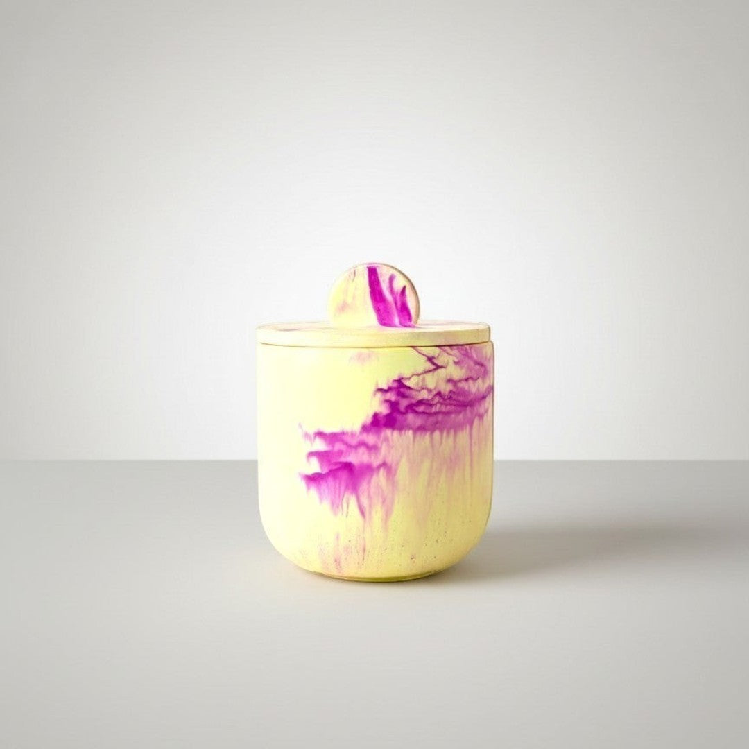 Doodlations Coffee Bar & Boutique Blackberry Jam marbled concrete candle with lid, yellow and violet tones, soy blend wax.