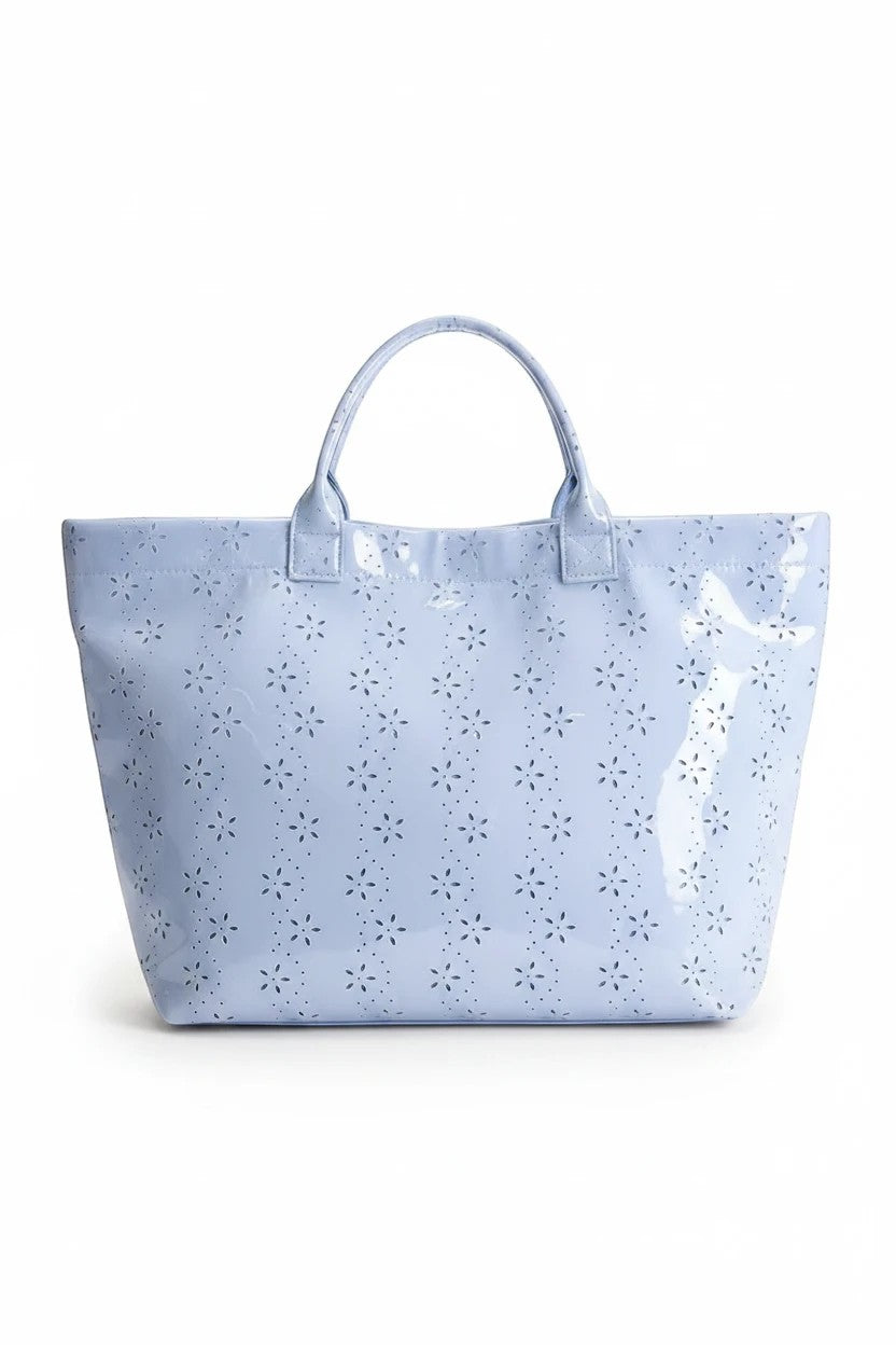 Doodlations Coffee Bar & Boutique baby blue glossy tote bag with a delicate floral eyelet pattern and top handles.