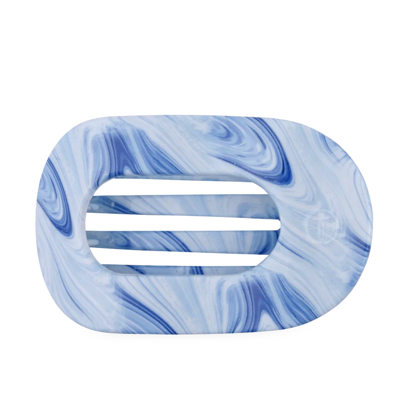 Doodlations Coffee Bar & Boutique flat round hair clip in blue and white marble pattern for comfortable all-day wear