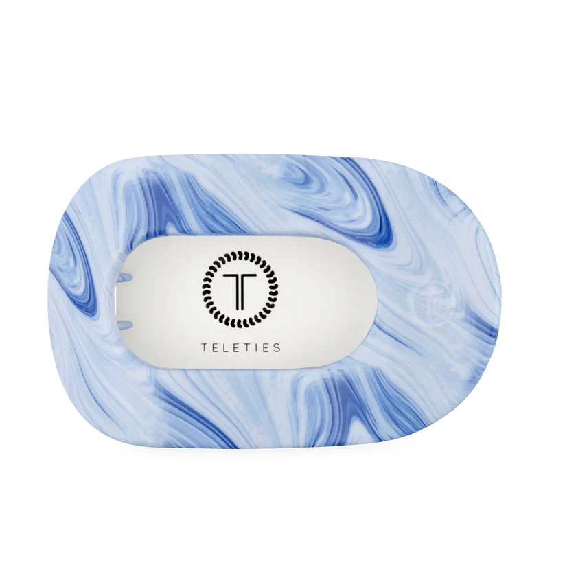 Doodlations Coffee Bar & Boutique TELETIES flat round hair clip in a blue and white marbled pattern