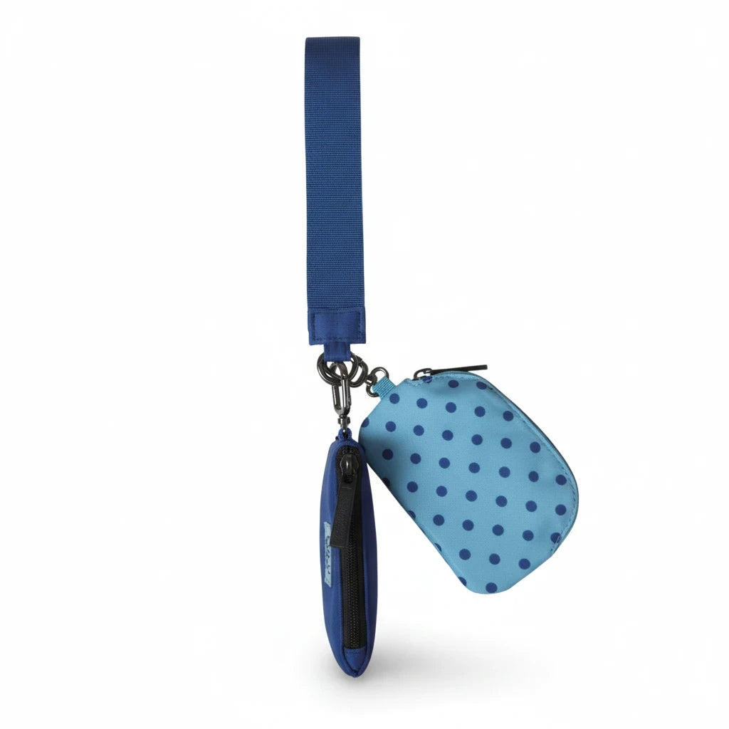 Doodlations Coffee Bar & Boutique blue and navy polka dot double pouch wristlet with a matching wrist strap
