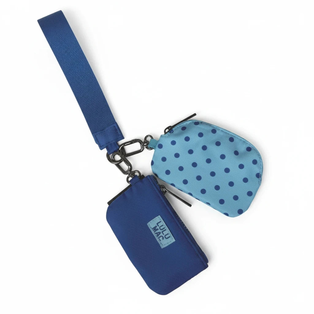 Doodlations Coffee Bar & Boutique Lulu Mac double pouch wristlet in blue and navy with a polka dot pattern.