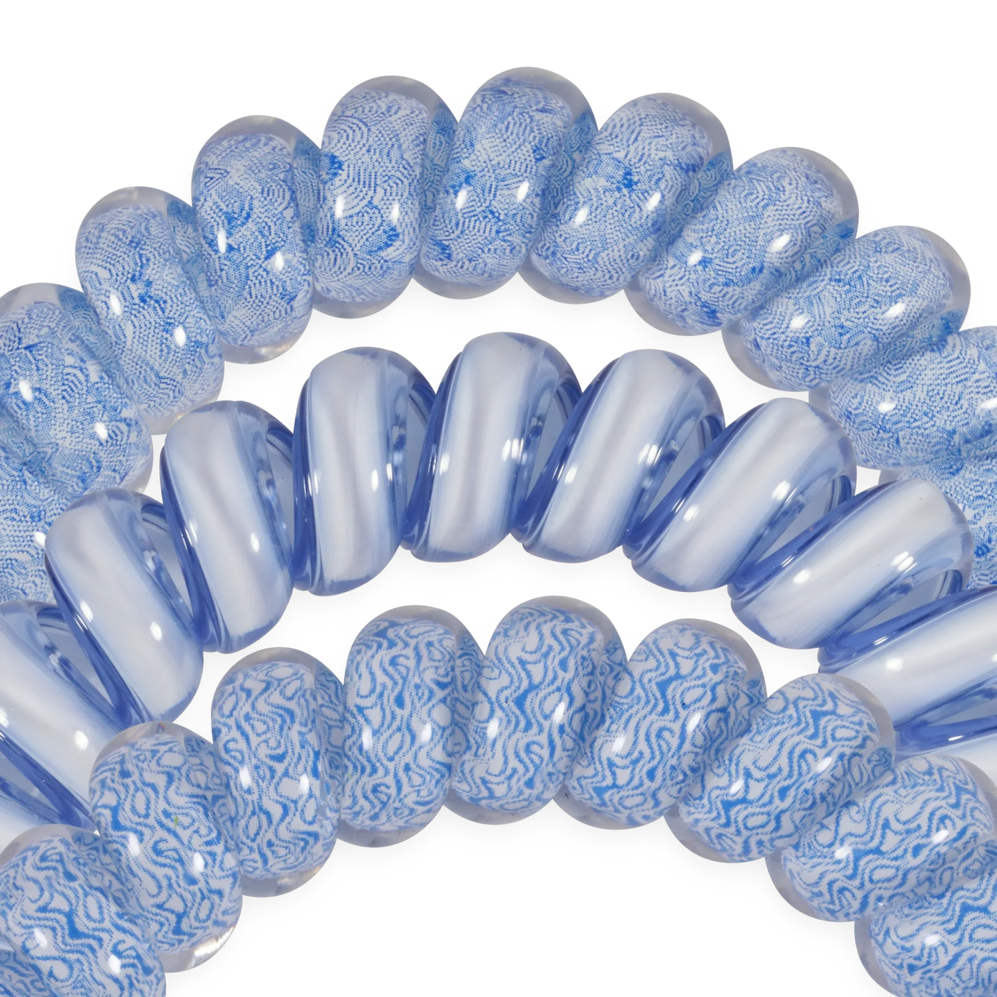 Doodlations Coffee Bar & Boutique Tide & True blue and white patterned spiral hair ties for damage-free styling.