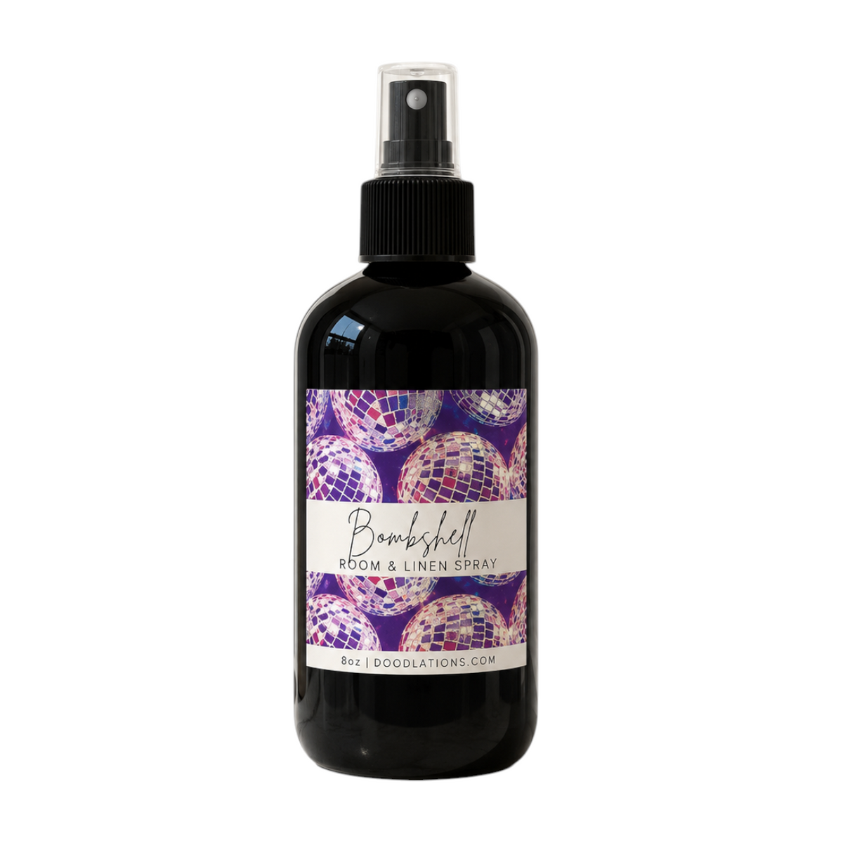 Doodlations Coffee Bar & Boutique Bombshell room and linen spray in a black 8oz bottle with disco ball label design.