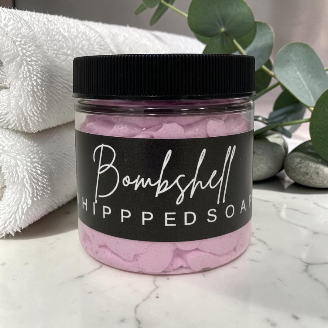 Doodlations Coffee Bar & Boutique Bombshell whipped soap in a 4 oz jar with light purple cream and black label.