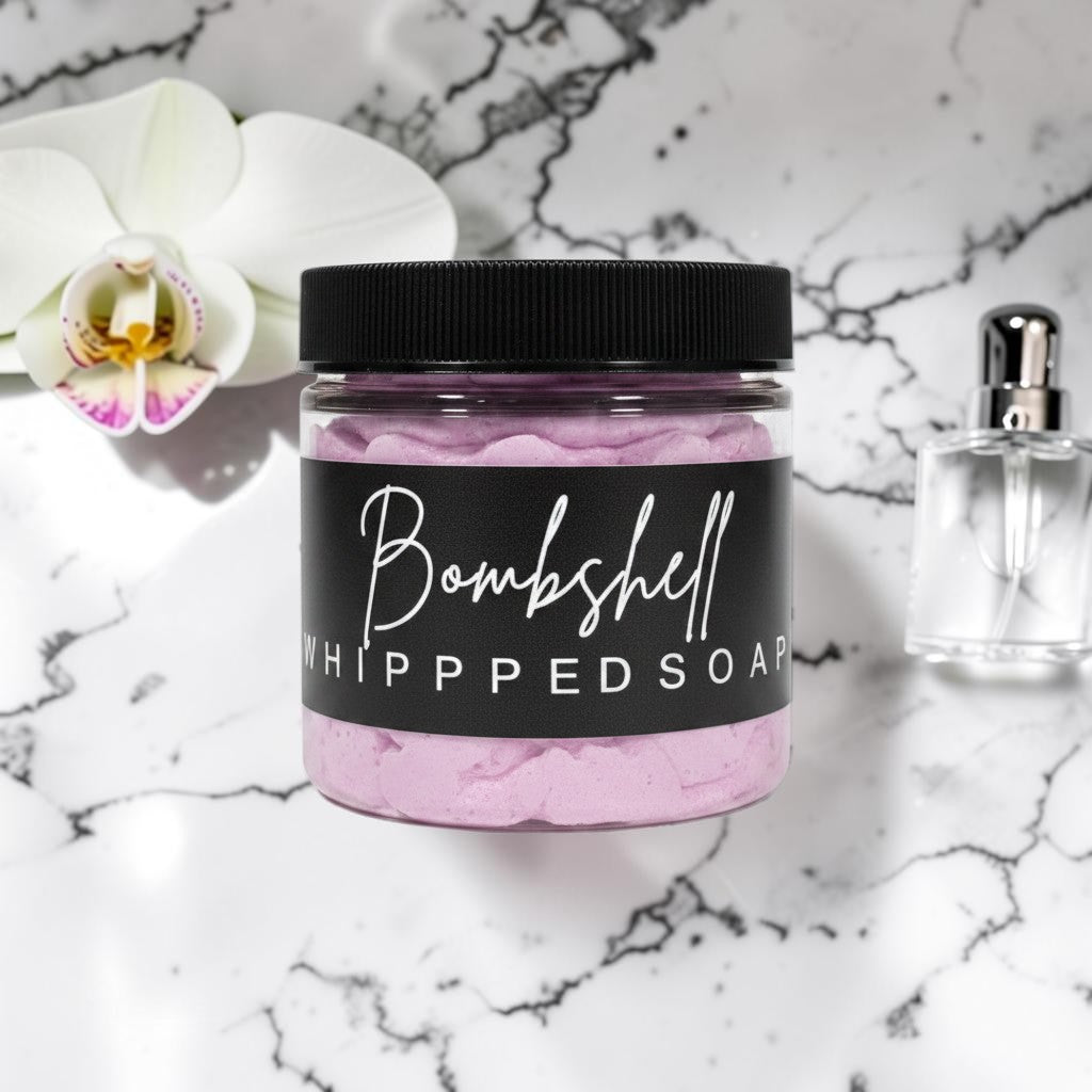 Doodlations Coffee Bar & Boutique Bombshell whipped soap in a 4 oz clear jar with a black lid and label.