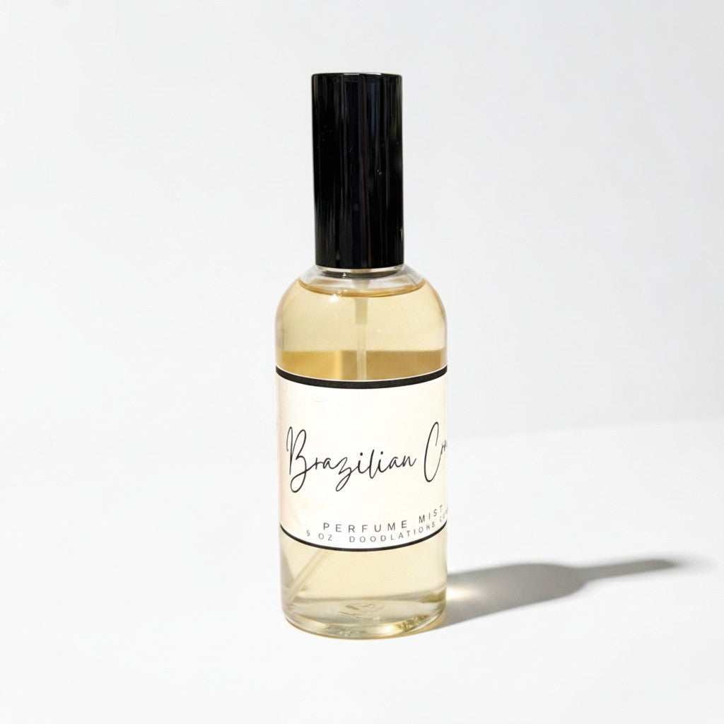 Doodlations Coffee Bar & Boutique Brazilian Crush luxury fine mist perfume in a clear glass bottle with black cap.