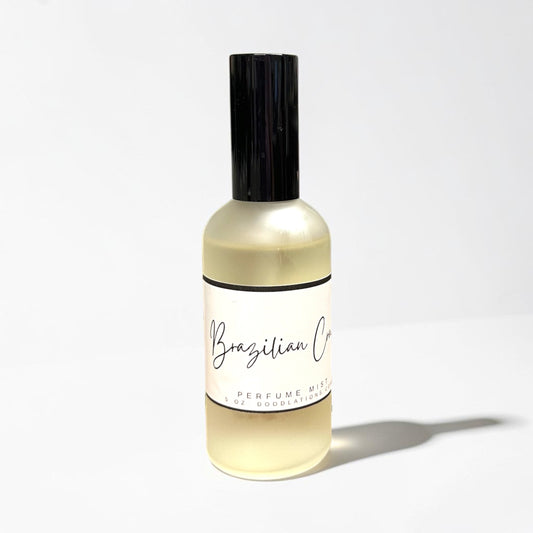 Doodlations Coffee Bar & Boutique Brazilian Crush fine mist perfume in a clear glass bottle with a black cap.