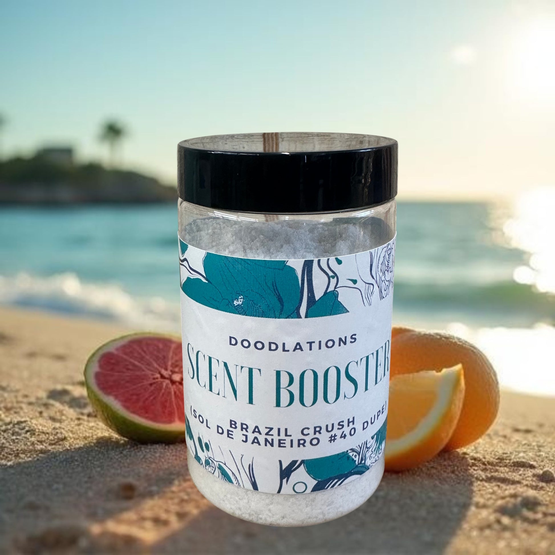 Doodlations Coffee Bar & Boutique Brazilian Crush laundry scent booster in a clear jar with a black lid. Features floral design.