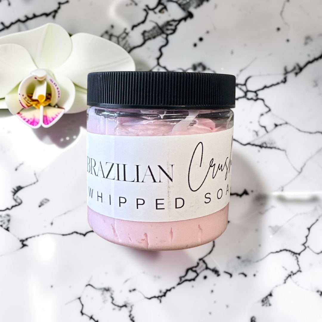 Doodlations Coffee Bar & Boutique 4oz Brazilian Crush whipped soap in a clear jar with a black lid.