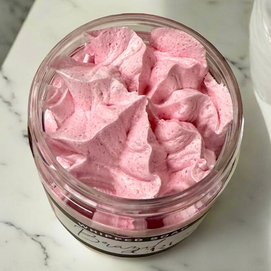 Doodlations Coffee Bar & Boutique Brazilian Crush whipped soap in a 4 oz jar with a fluffy pink creamy texture.