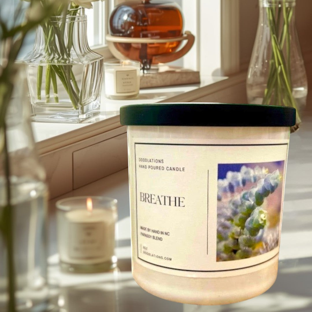 Doodlations Coffee Bar & Boutique Breathe luxury hand-poured soy blend candle with a calming scent profile.