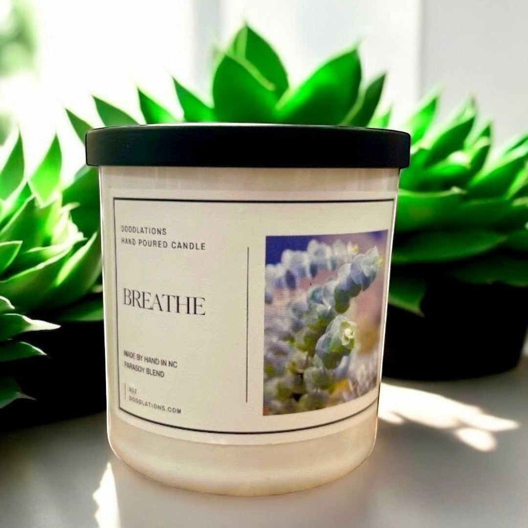 Doodlations Coffee Bar & Boutique Breathe hand-poured soy blend candle with a calming scent profile.