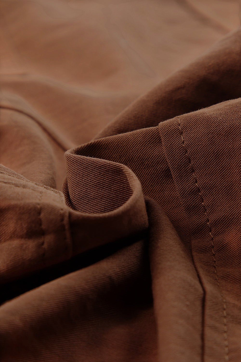 Doodlations Coffee Bar & Boutique brown cotton drawstring shorts with pockets. Relaxed fit, ideal for casual wear.