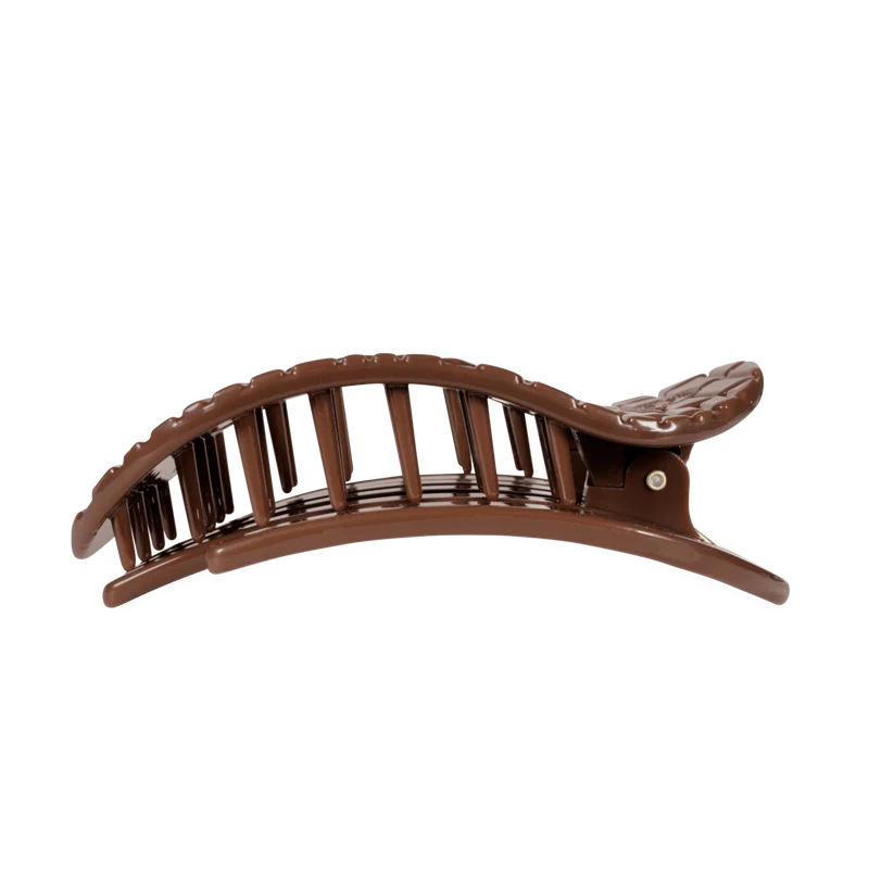 Doodlations Coffee Bar & Boutique brown crocodile textured flat round hair clip with flexible, durable teeth.