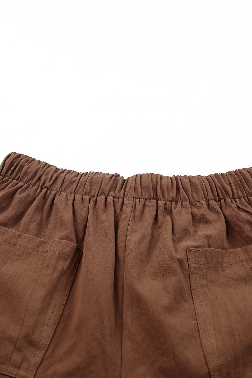 Doodlations Coffee Bar & Boutique brown cotton drawstring shorts with elastic waist and side pockets.