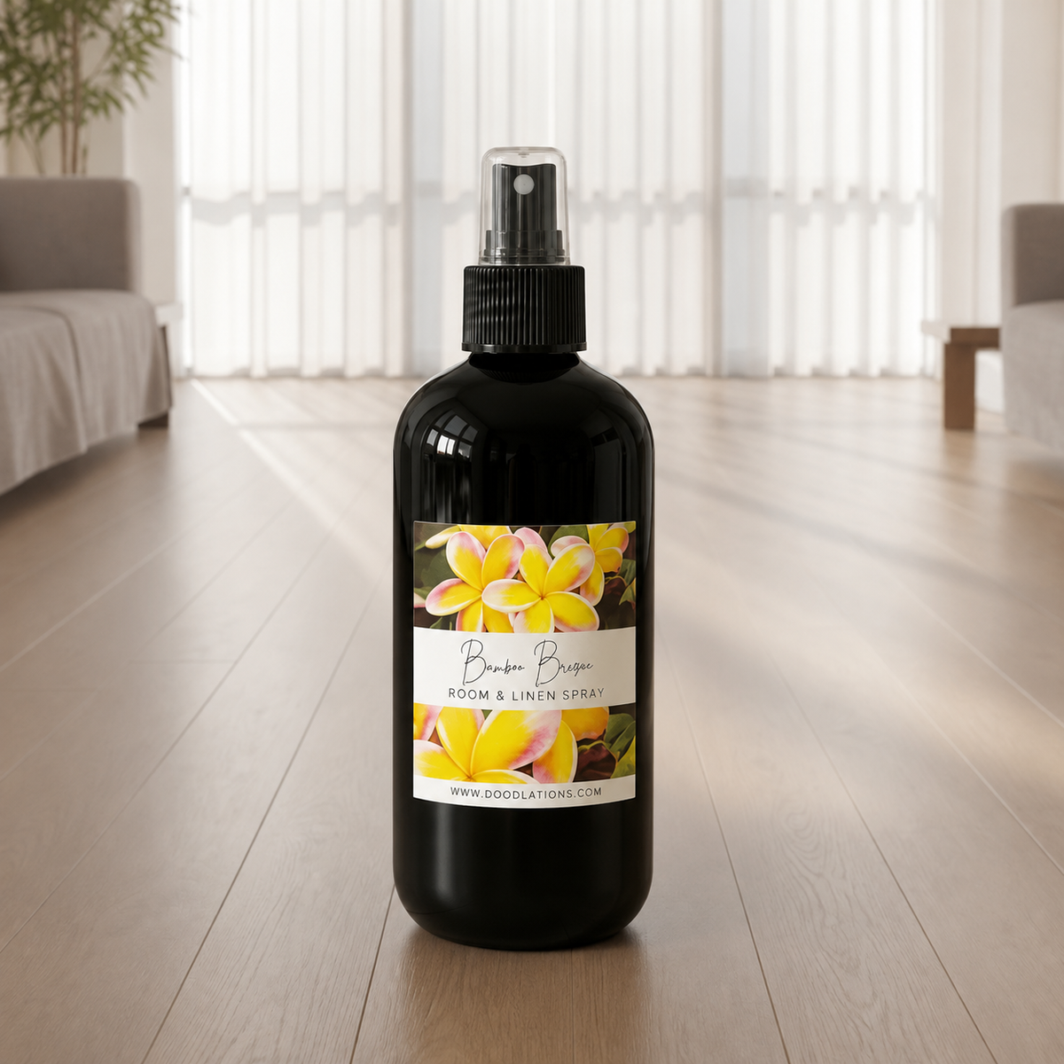 Doodlations Coffee Bar & Boutique Bum Bum room and linen spray in a black bottle with a tropical floral label
