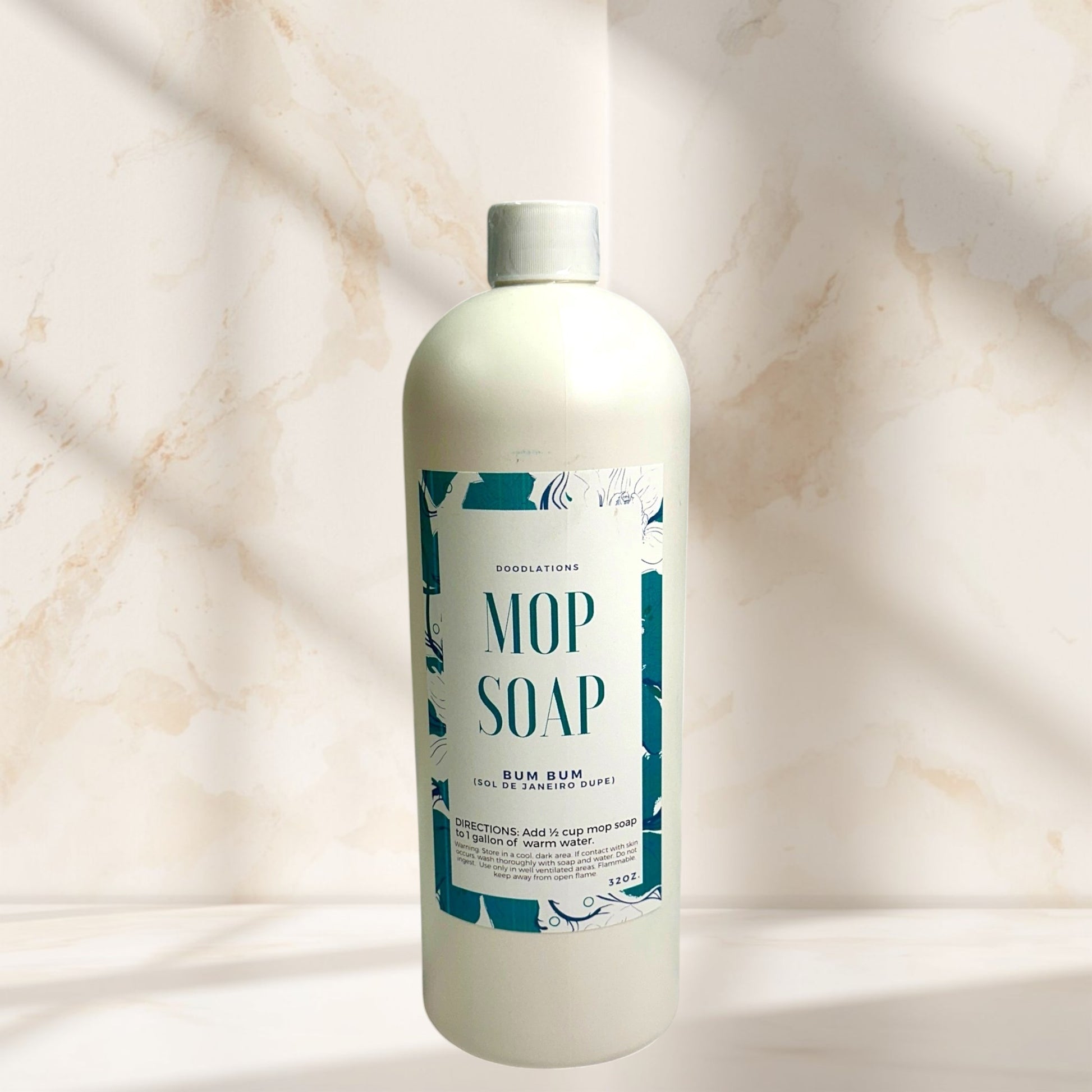 Doodlations Coffee Bar & Boutique Bum Bum concentrated mop soap, 32 oz, with tropical pistachio, coconut, and caramel scent.