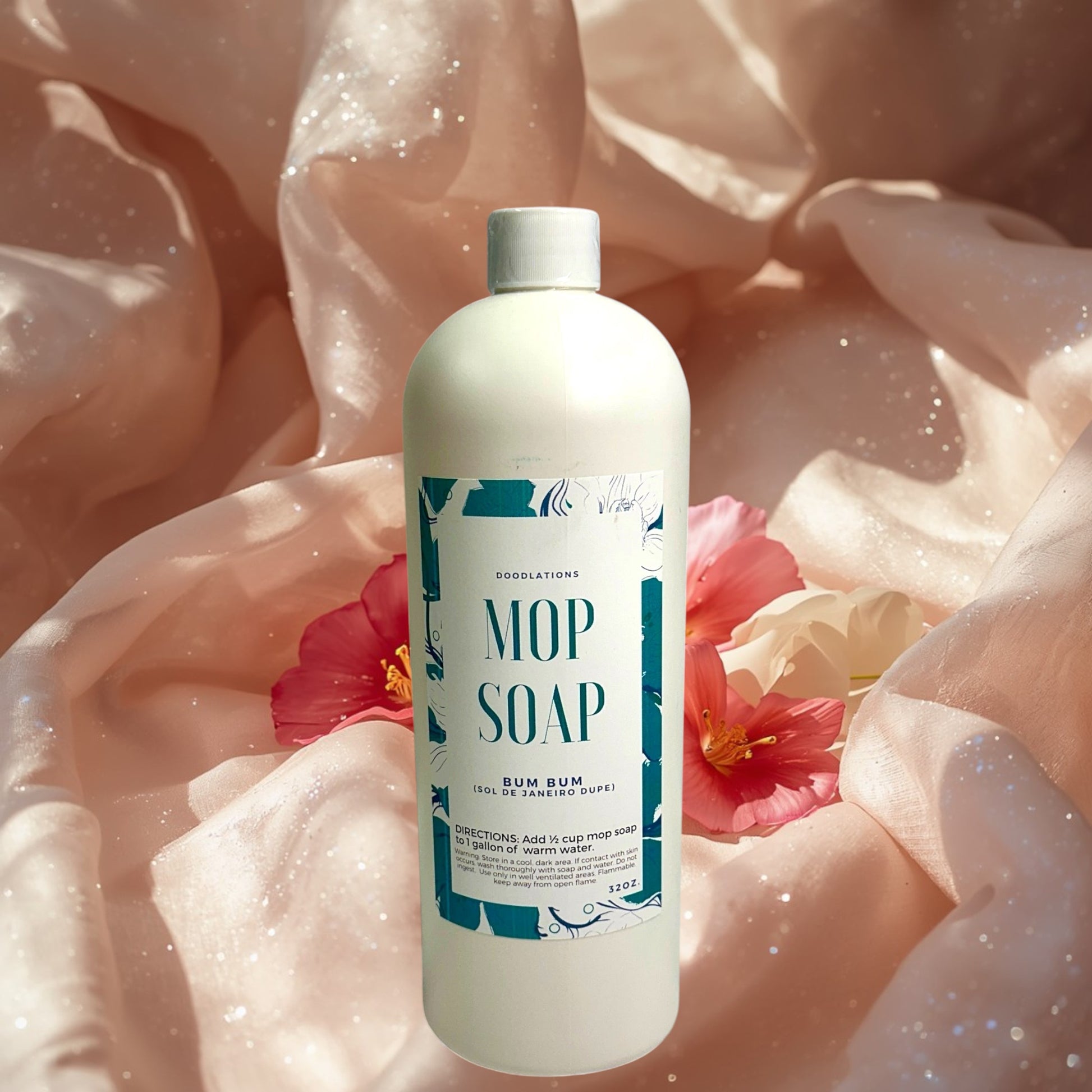 Doodlations Coffee Bar & Boutique Bum Bum concentrated mop soap, 32 oz bottle with tropical scent notes.